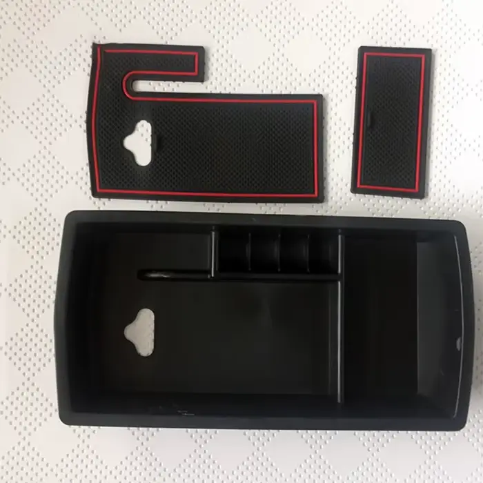 Boîte de rangement pour accoudoir central