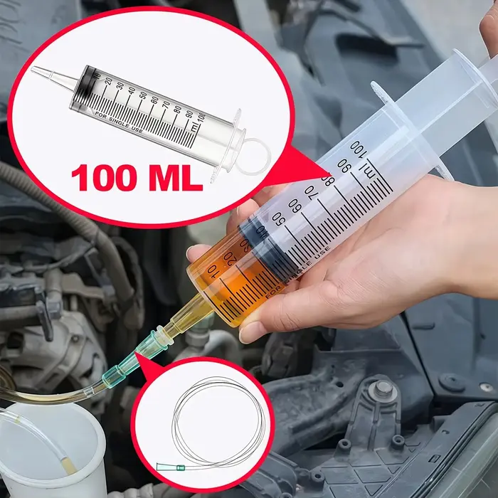 Outil de remplissage et d'aspiration d'huile à double usage pour automobile