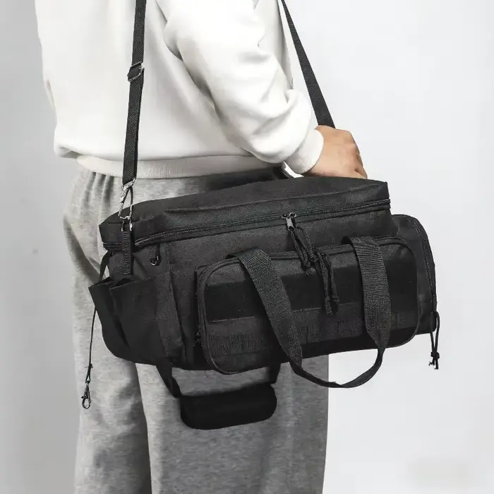 Outils comprenant un sac de rangement avec bandoulière