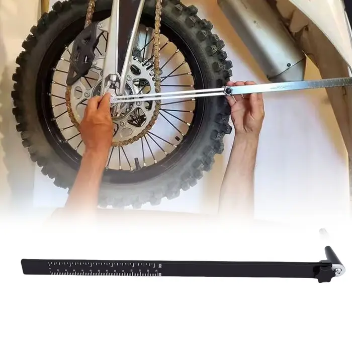 Outil de mesure de la chute de suspension arrière