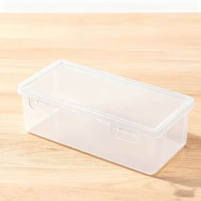 La boîte de rangement en plastique blanc est étanche, légère et durable, et est un outil de rangemen
